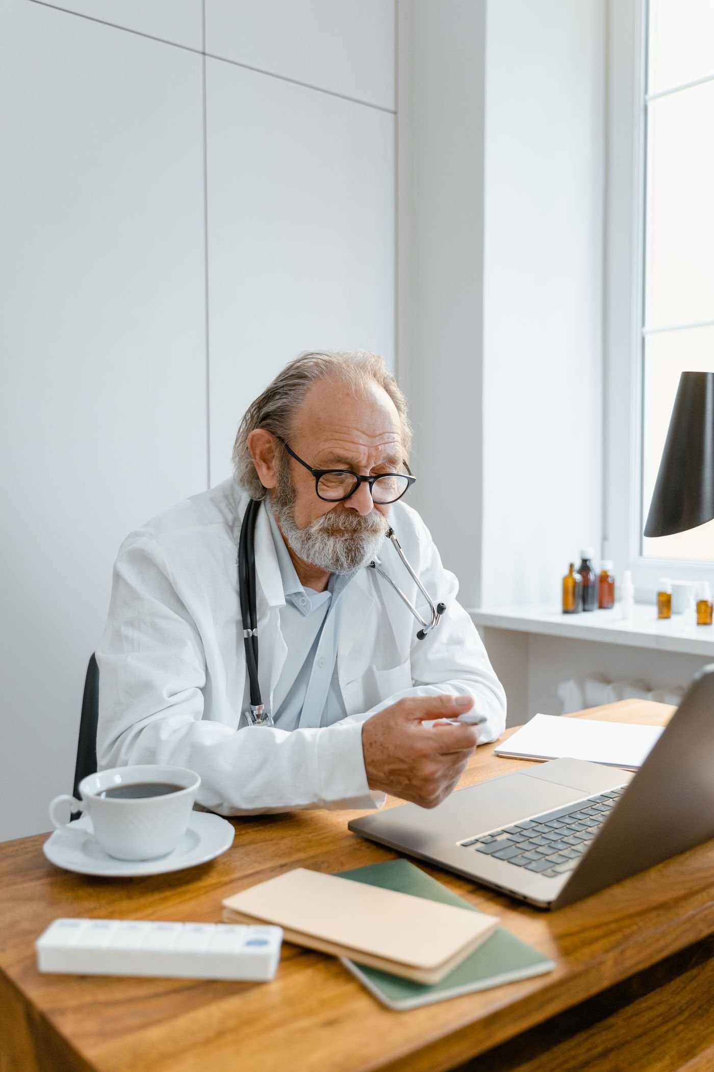 Doctor attending a patient through an online telehealth consultation